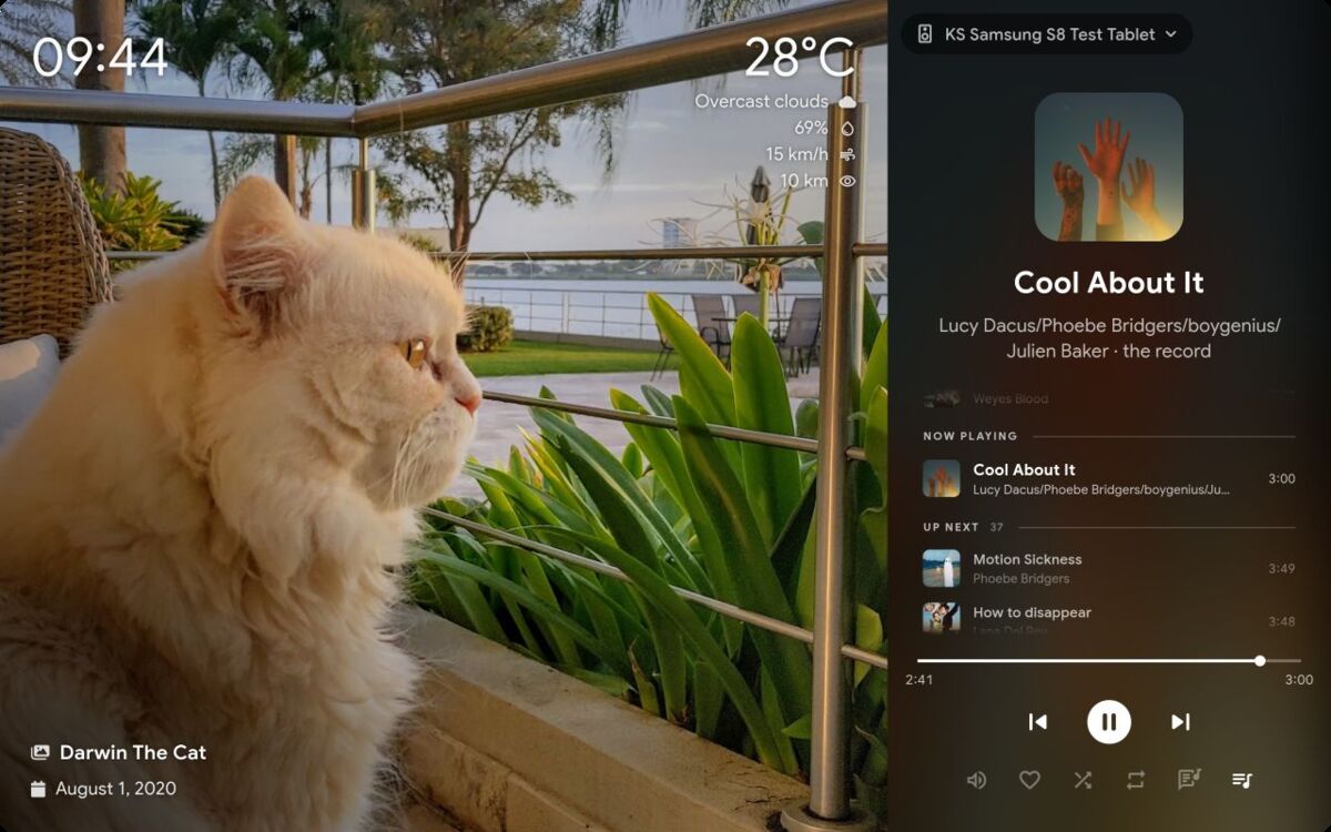 Photo screensaver with clock and weather